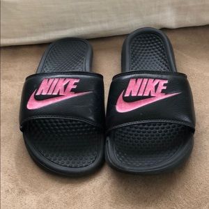 Nike slides.